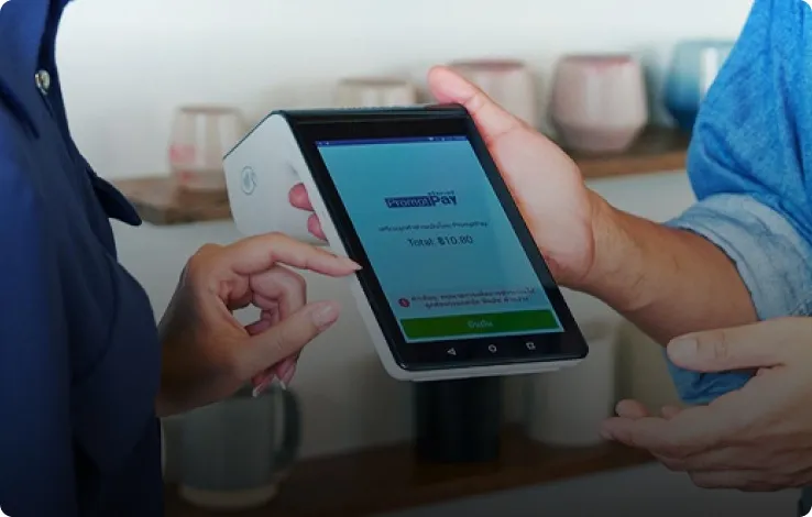 A customer paying on a Qashier point-of-sale terminal