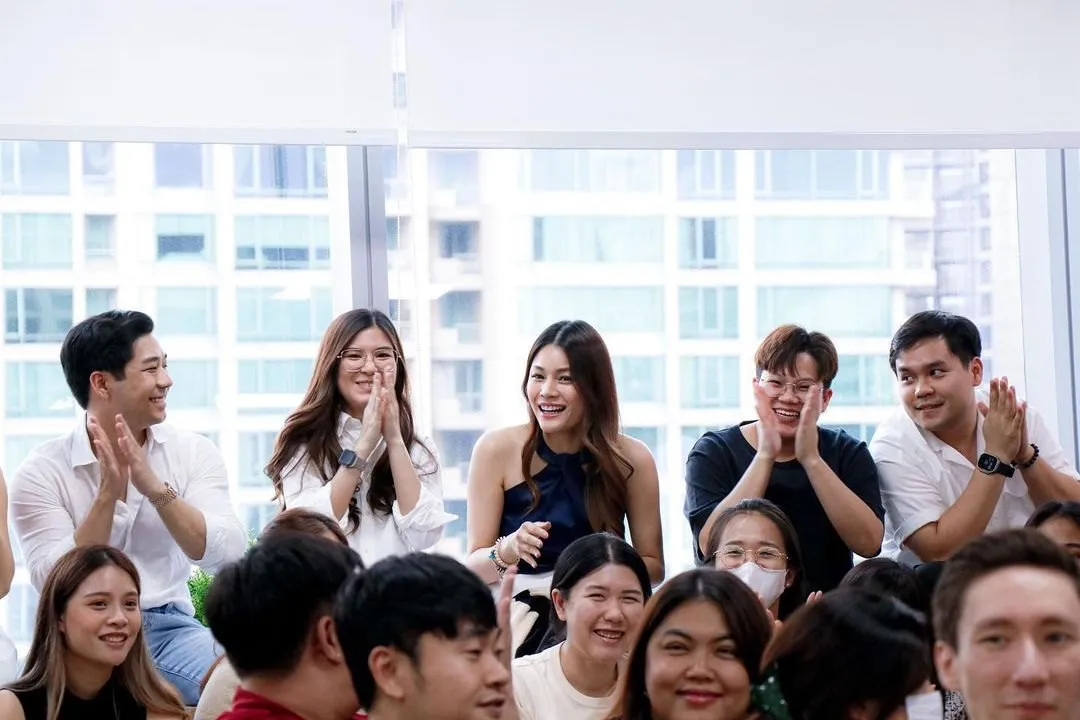 The Primal team applauding in the office
