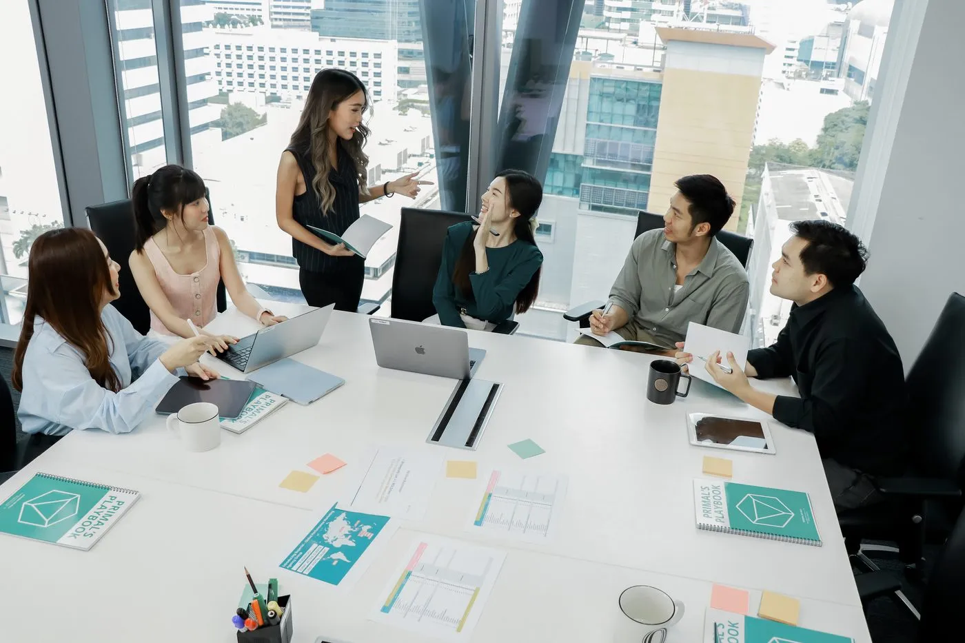 The Primal team planning together around a meeting table