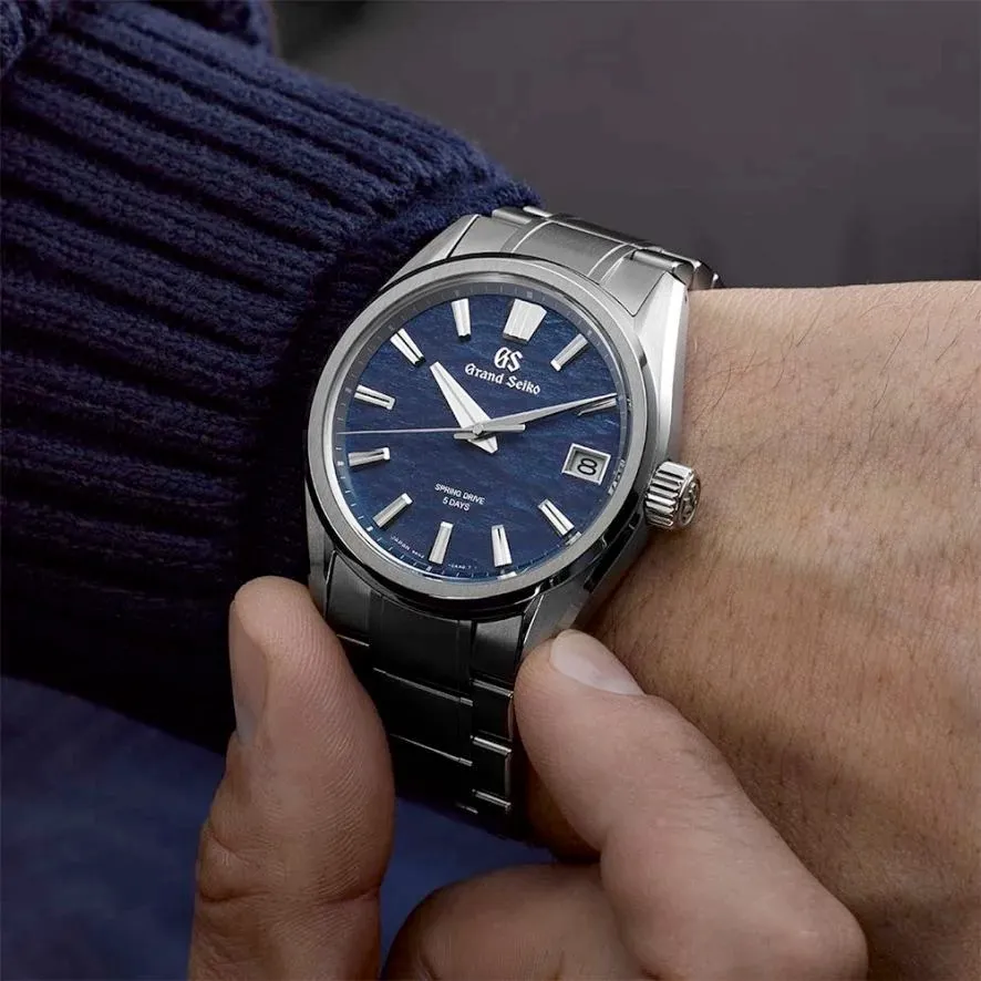 A Grand Seiko watch on a wrist